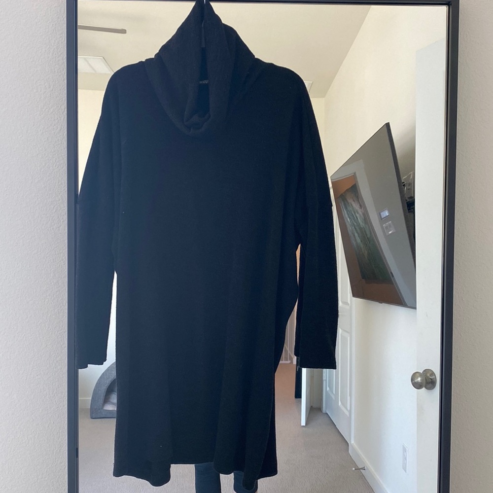 Black turtleneck sweater dress.